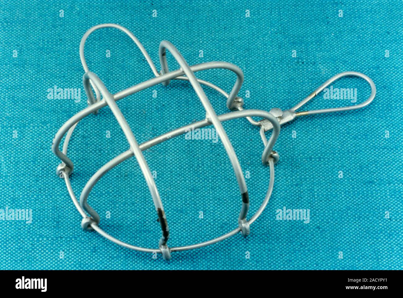 Anaesthesia mask, circa 1900. This is a McCardie wire frame mask. The wire frame was covered with cotton gauze and placed over the patient's mouth and Stock Photo