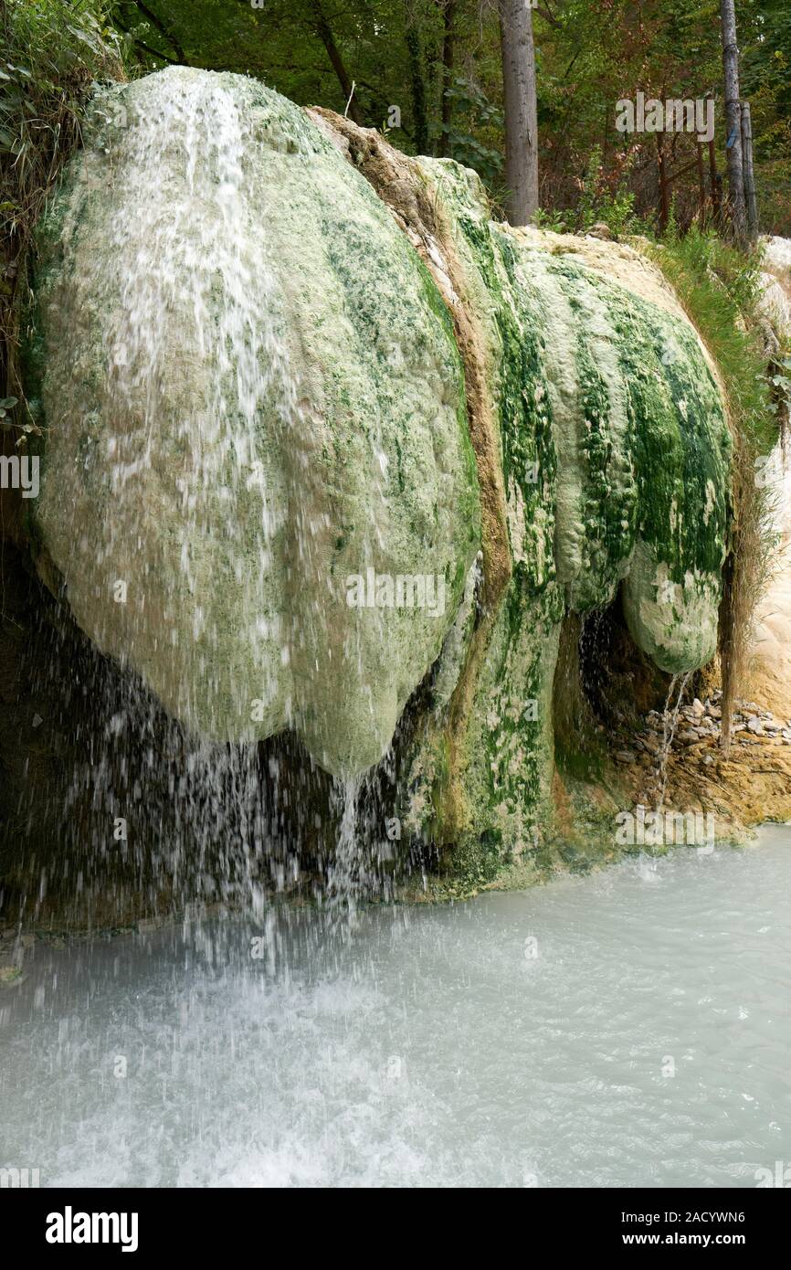 Calcium carbonate concretion deposits and waterfall at Bagni San Filippo a natural hot spring in Castiglione d'Orcia Tuscany Italy Europe Stock Photo