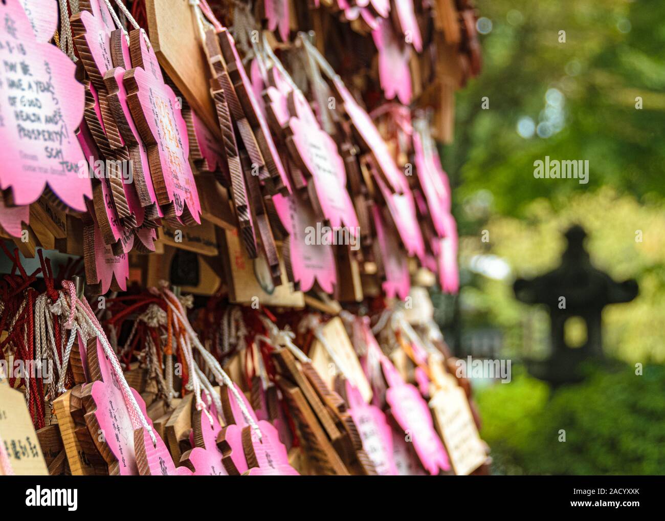 Stacks of woden 'ema' votive plaques in one of the Tokyo's temples, Japan Stock Photo
