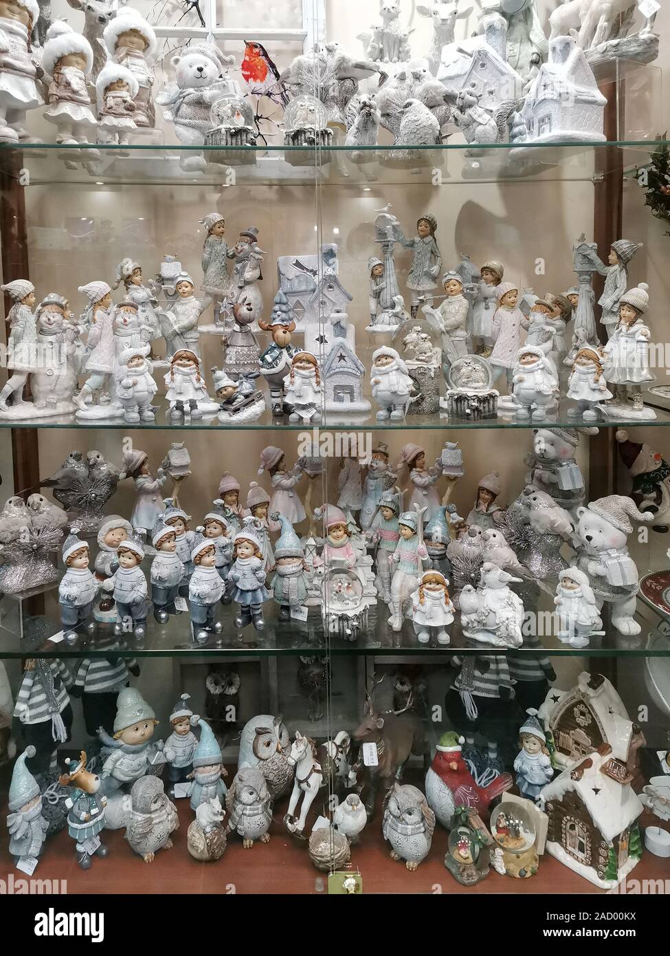 Yekaterinburg, Russia - November,23,2019: Glass window with Christmas gift  porcelain statuettes of toy animals and children in Church shop of Alexande  Stock Photo - Alamy