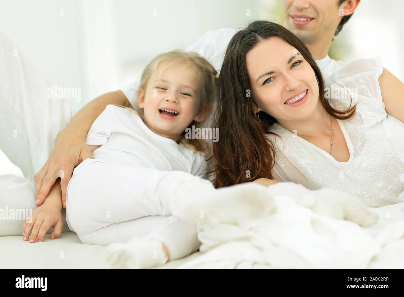 background image of a happy young family Stock Photo - Alamy