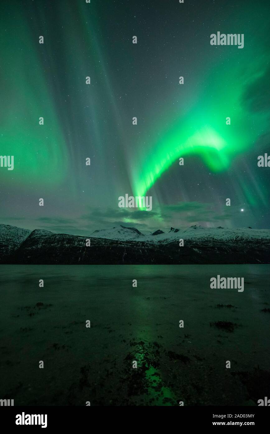 Aurora borealis. Aurora borealis (northern lights) in the sky over a ...