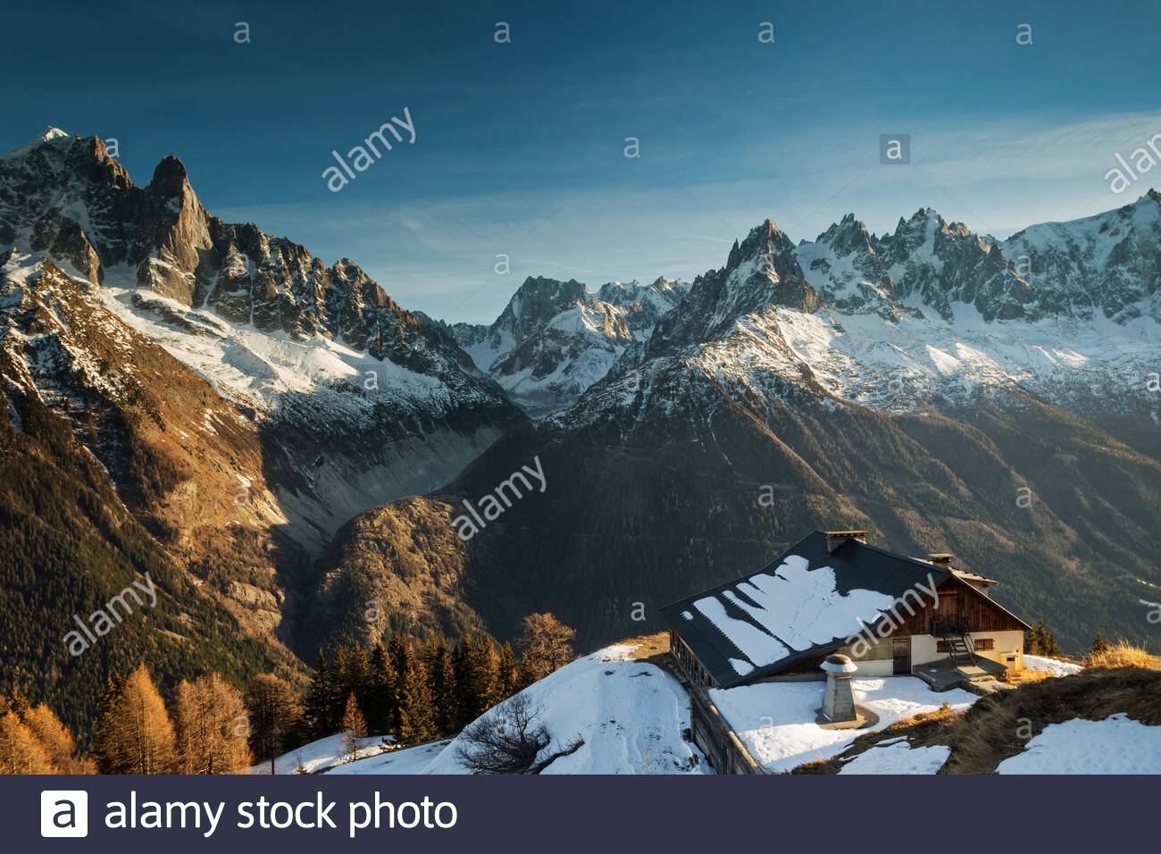 Cabin On A Mountain Top In Winter At Sunset In Flegere France