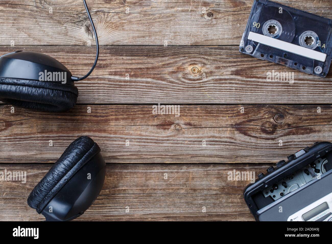 Cassette tapes, player and headphones . Top view. Stock Photo