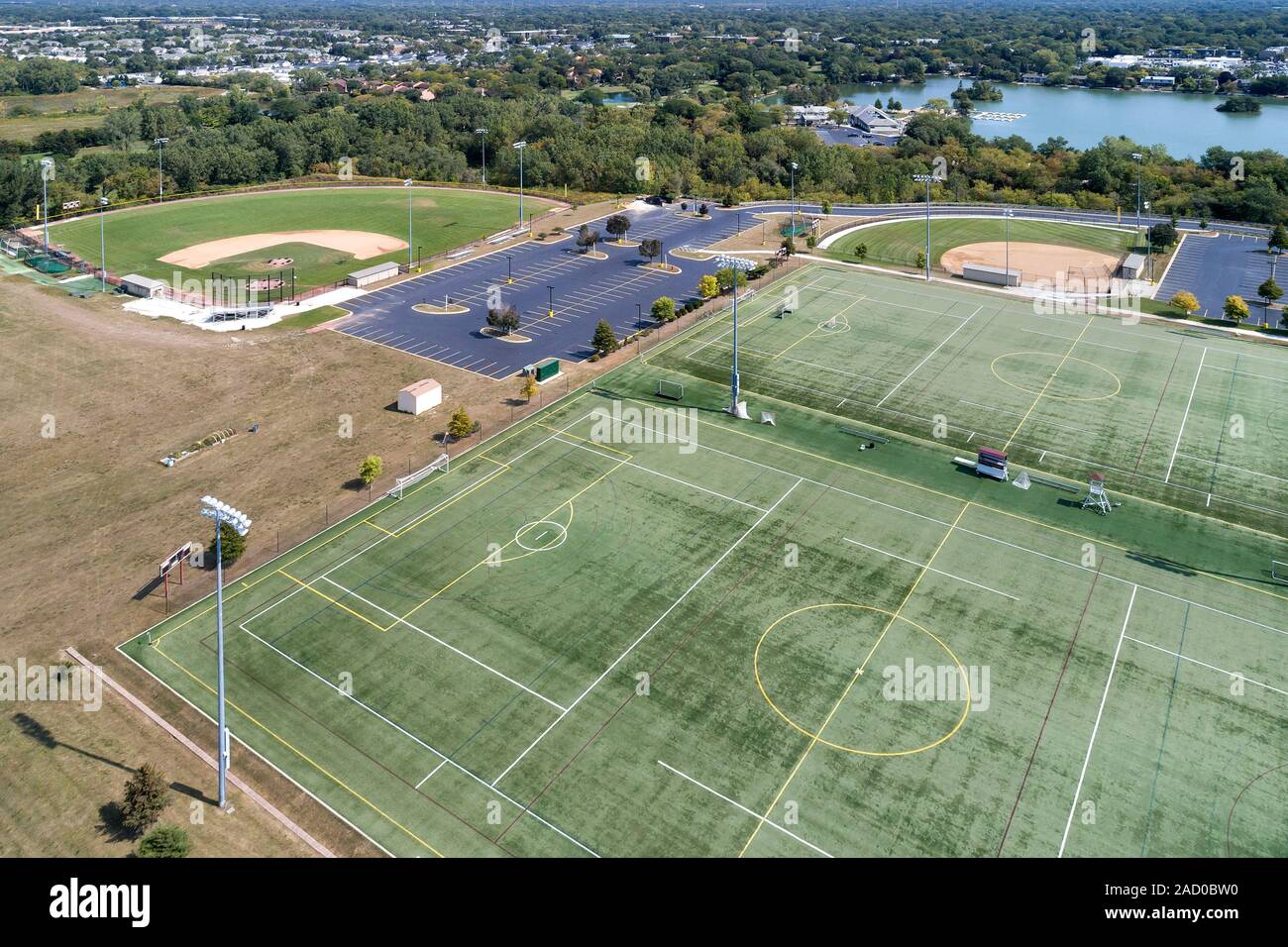 Aerial view of a high school playfield with baseball diamonds and a football field in Glenview, IL. USA Stock Photo