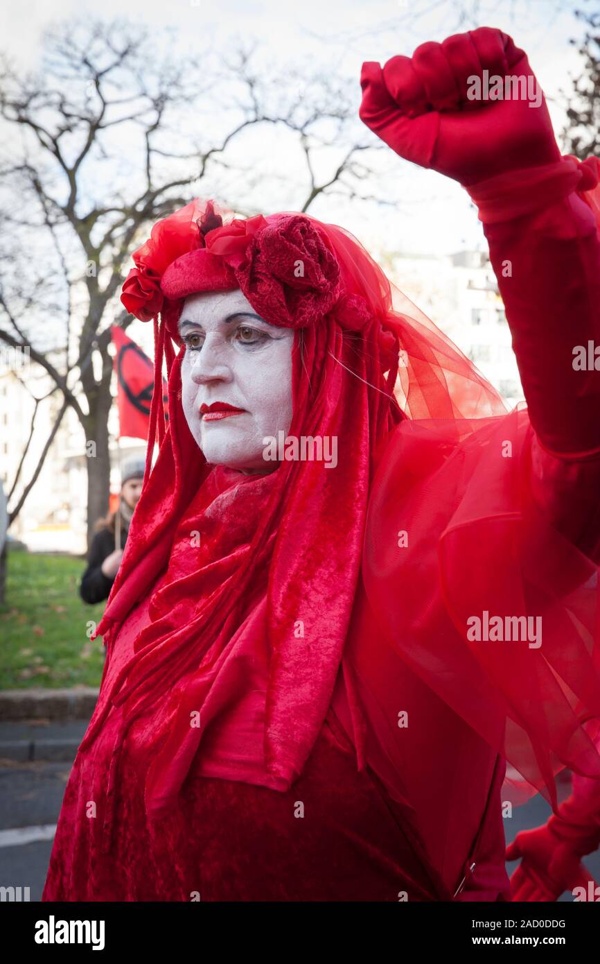 November 29, 2019 - Cologne, Germany. The performance group Red Rebels of Extinction Rebellion at the Fridays for Future climate strike. 4th global da Stock Photo