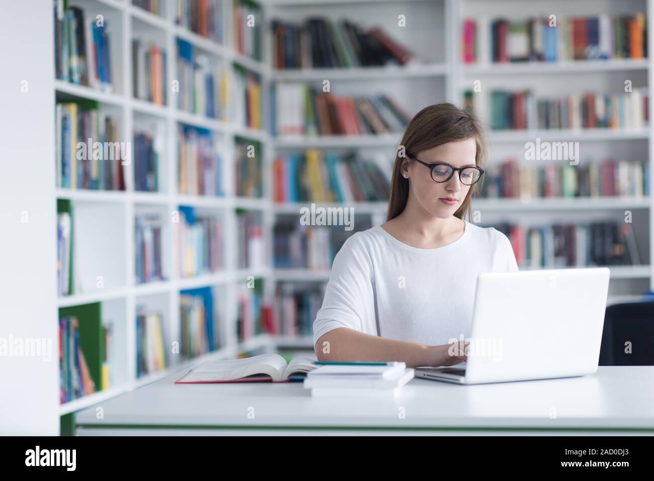 student study in library Stock Photo - Alamy