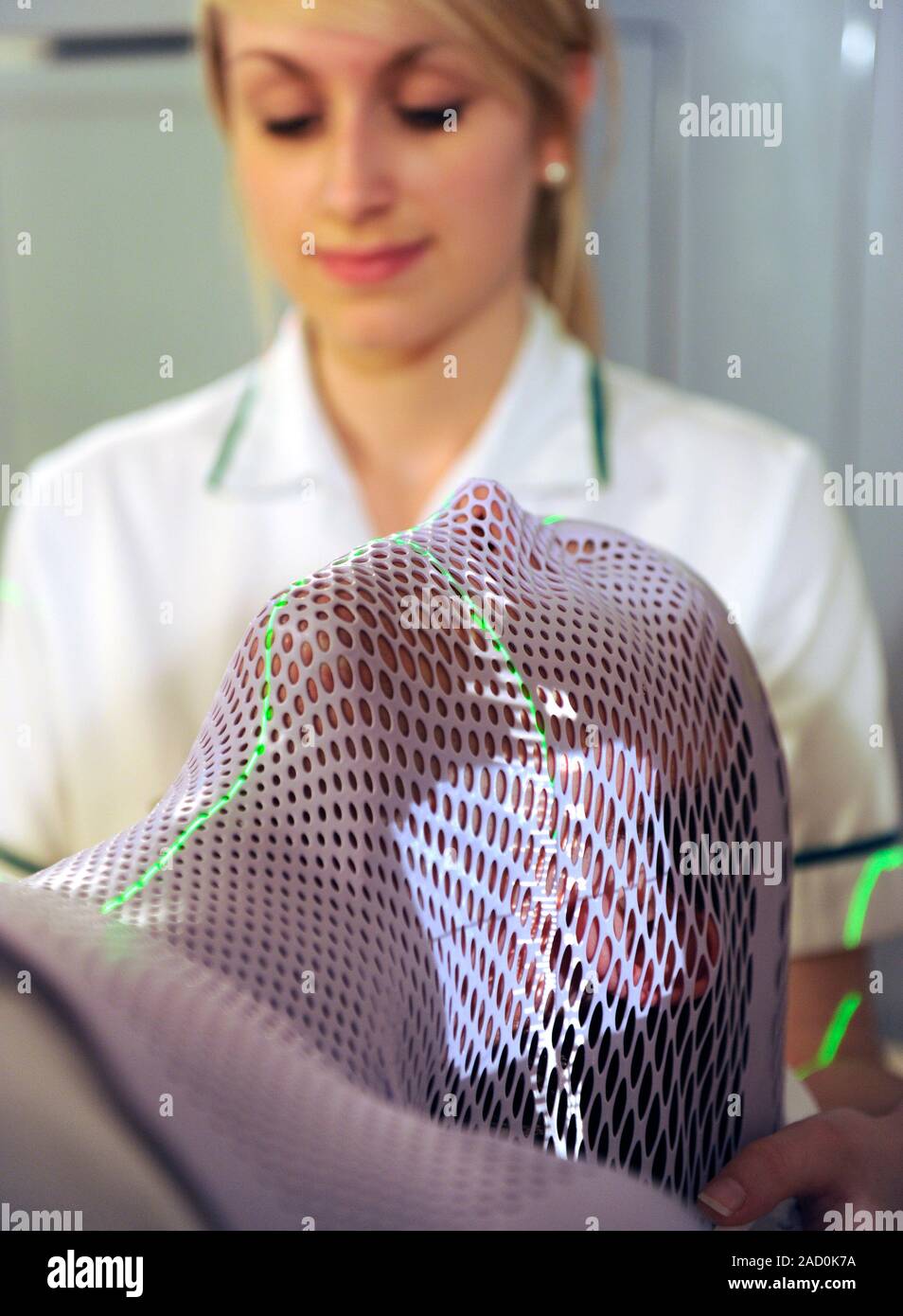 Radiotherapy mask. Medical worker and a patient in the radiotherapy