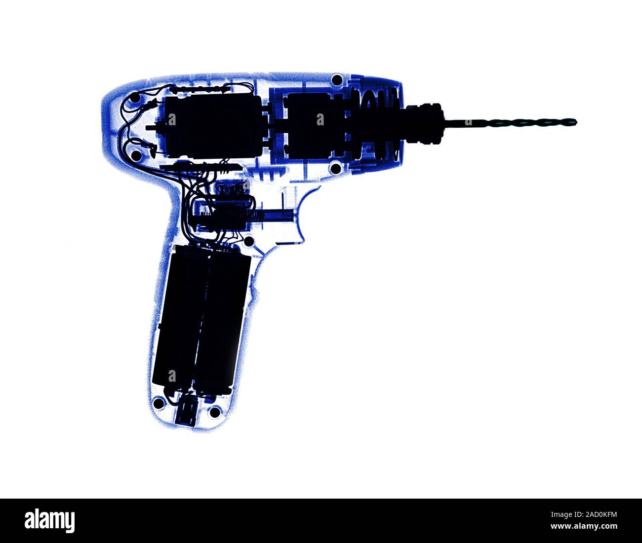 Power drill, coloured X-ray. Stock Photo