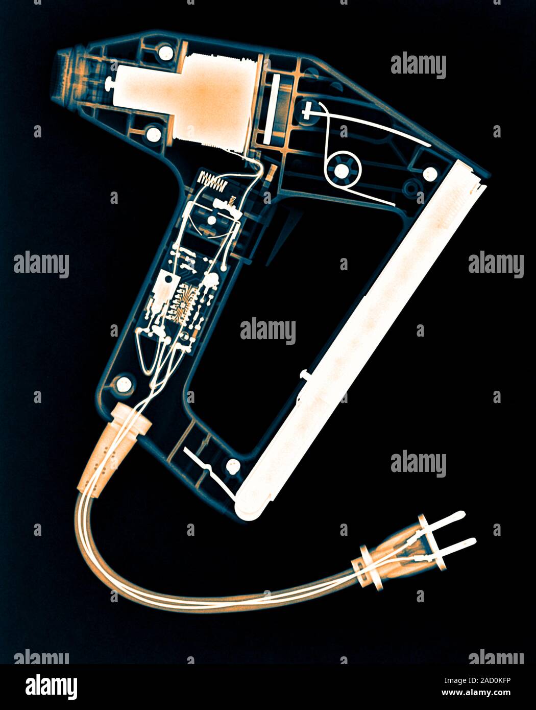 Stapler, coloured X-ray. Stock Photo