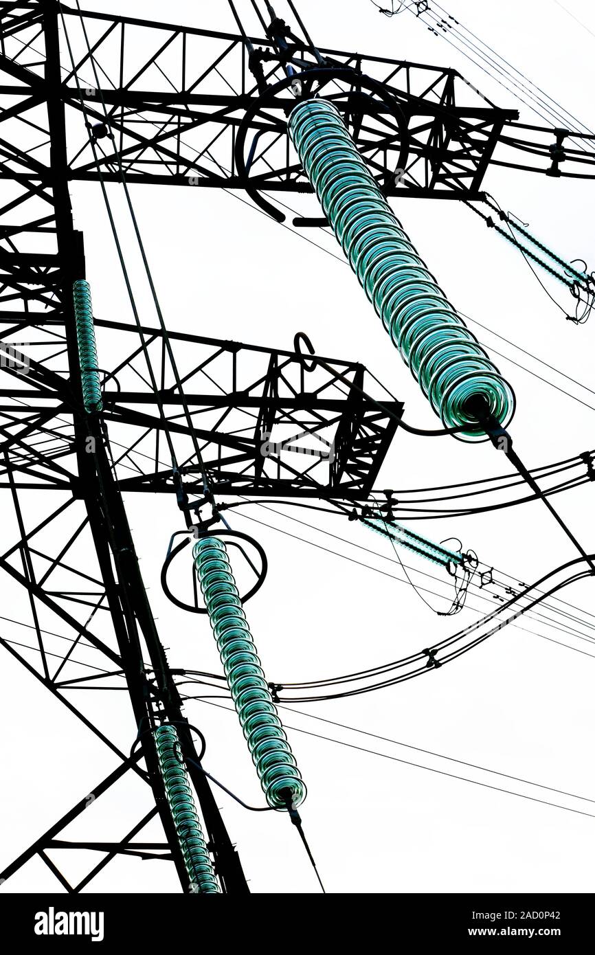 Glass insulators. Suspended glass discs in a cap and pin insulator strings. Cap and pin