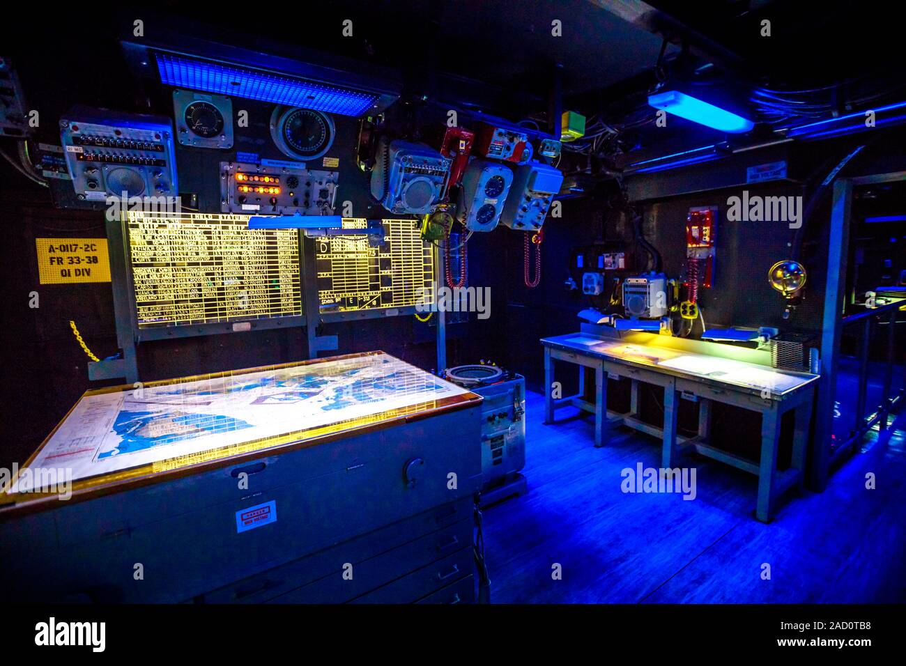 San Diego, Navy Pier, California, USA - JULY 31, 2018: dark war room with battle stations and instruments, consoles of Battleship Midway at San Diego Stock Photo