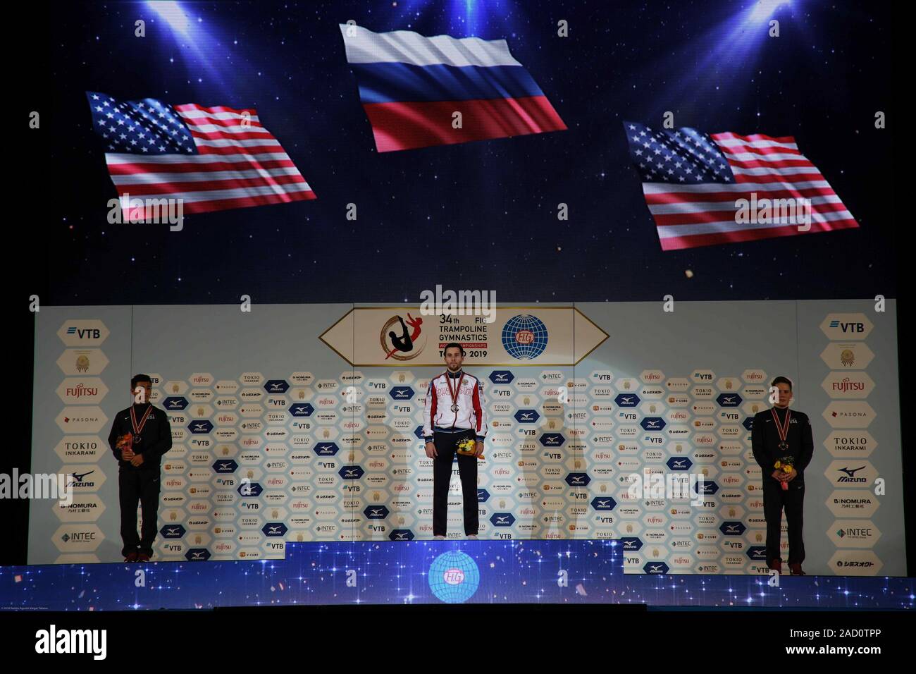Tokyo, Japan. 30th Nov, 2019. (from left) second place Ruben Padilla of United States, Zalomin Mikhail of Rusia, and Renkert Alexander of US during the 34th FIG Trampoline Gymnastics World Championships award ceremony at Ariake Gymnastics Center in Tokyo Japan on December 01, 2019. Photo by: Ramiro Agustin Vargas Tabares. Credit: Ramiro Agustin Vargas Tabares/ZUMA Wire/Alamy Live News Stock Photo