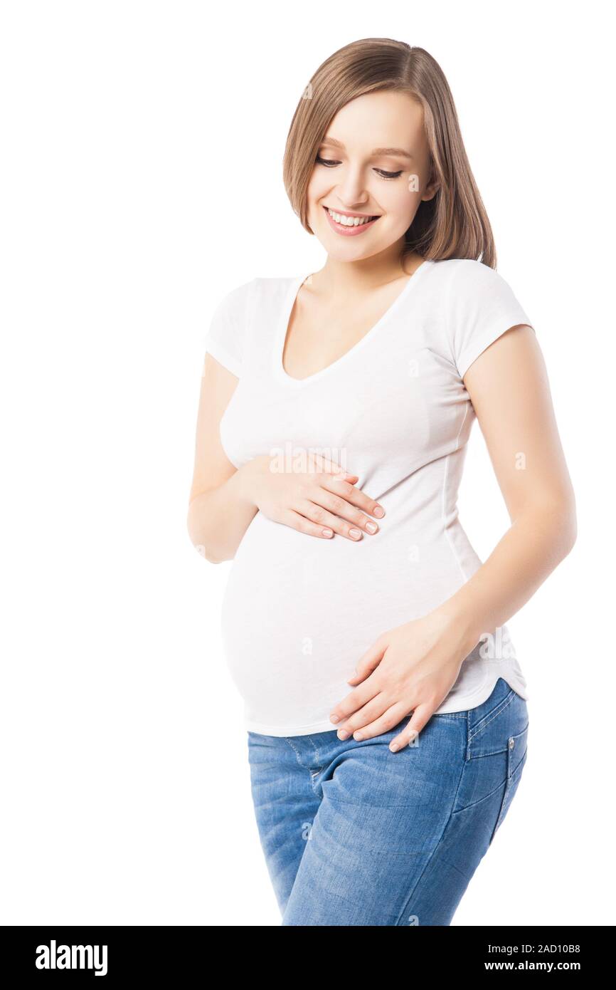 Portrait of smiling woman embracing her pregnant belly Stock Photo - Alamy