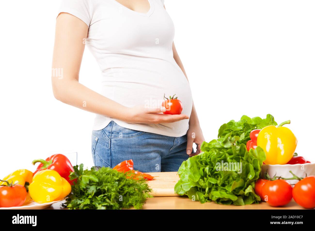 Pregnant woman with tomato Stock Photo Alamy