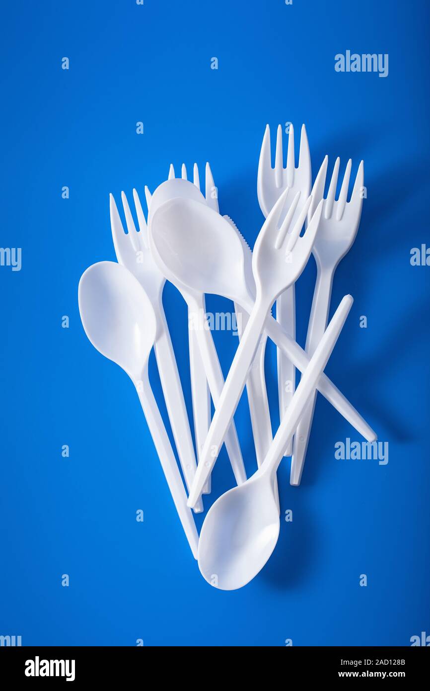 single use plastic forks spoons. concept of recycling plastic
