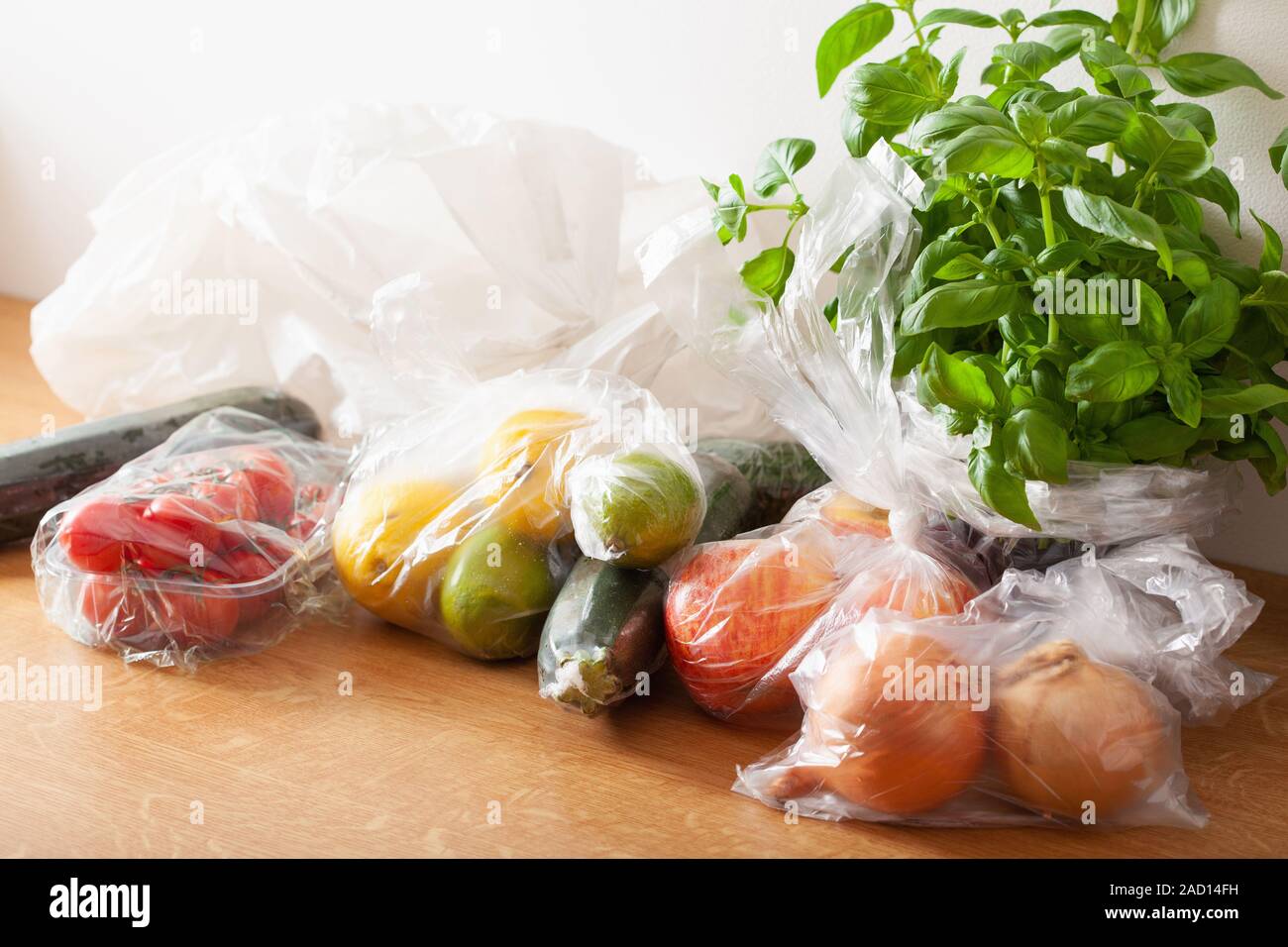 single use plastic waste issue. fruits and vegetables in plastic bags