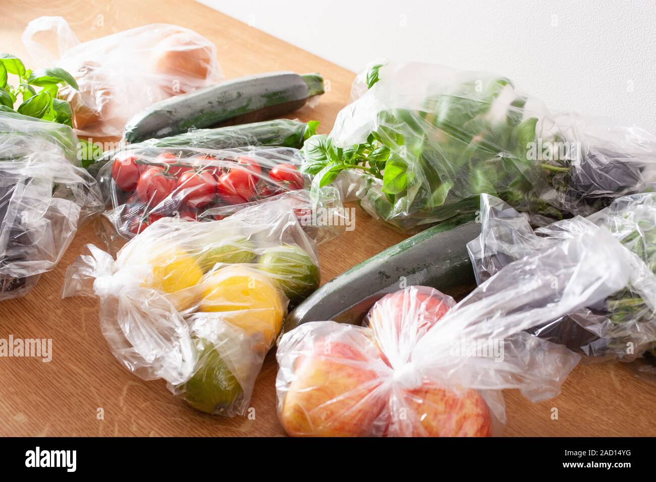 single use plastic waste issue. fruits and vegetables in plastic bags