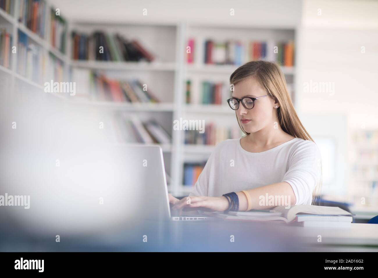 female student study in school library Stock Photo