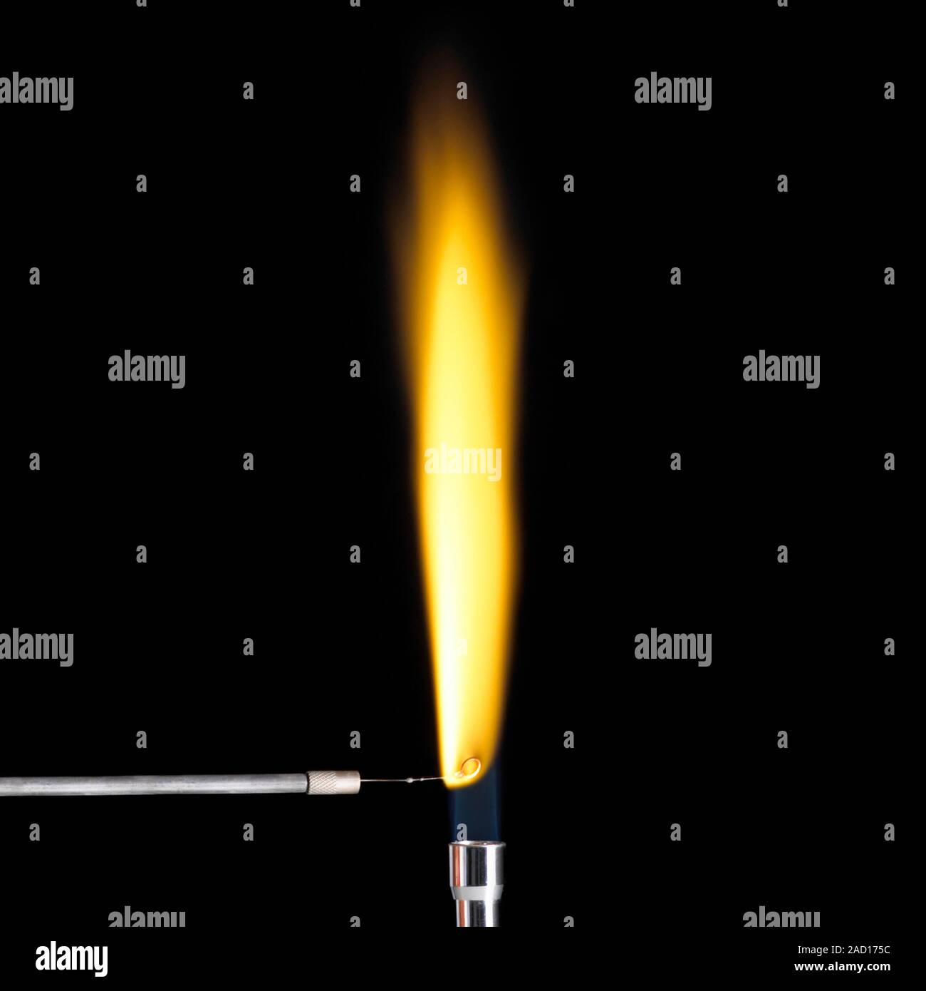 Sodium flame test. Positive result of a flame test for sodium (Na