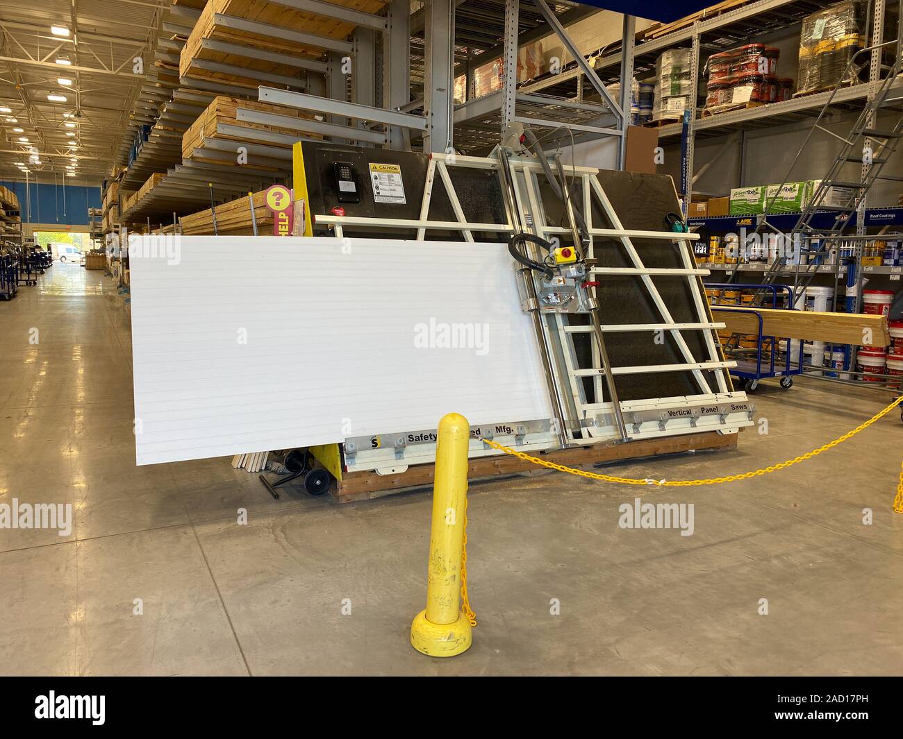 Orlando FL USA 11 19 19 The wood cutting station at Lowes home improvement store where an employee cuts wood for customers Stock Photo Alamy