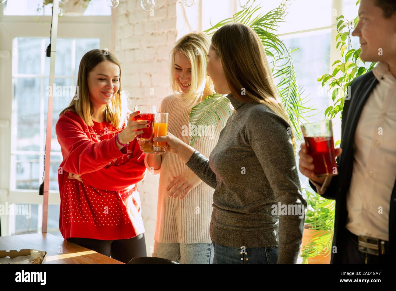 Happy coworkers celebrating while company party and corporate event