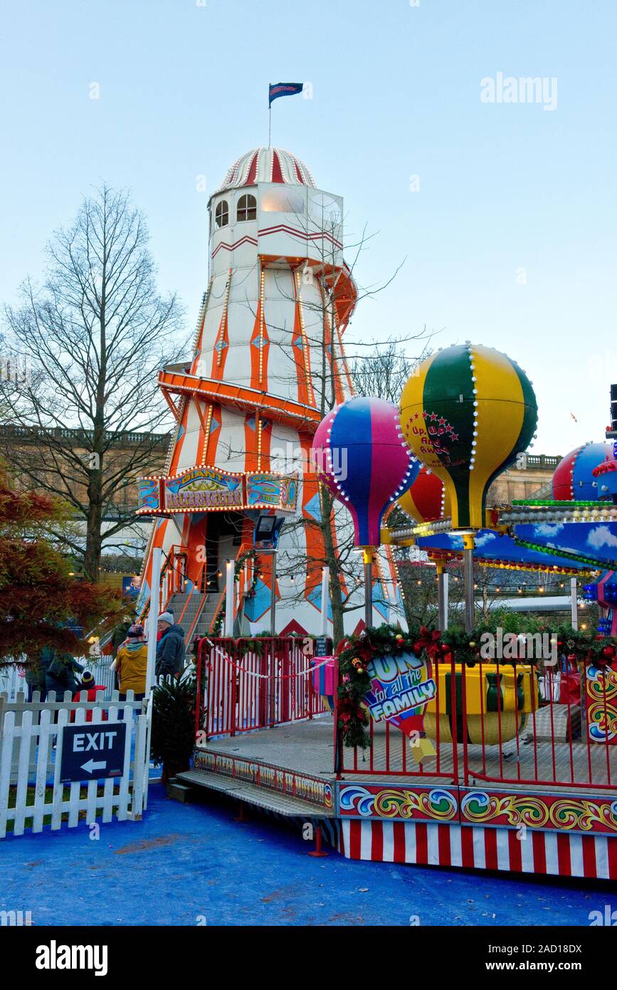 Helter Skelter and Balloon Race childrens fairgound rides. Edinburgh Christmas Market and Fair. Scotland Stock Photo