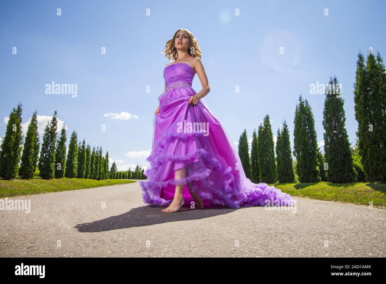Woman in pink beautiful dress hi-res stock photography and images - Alamy