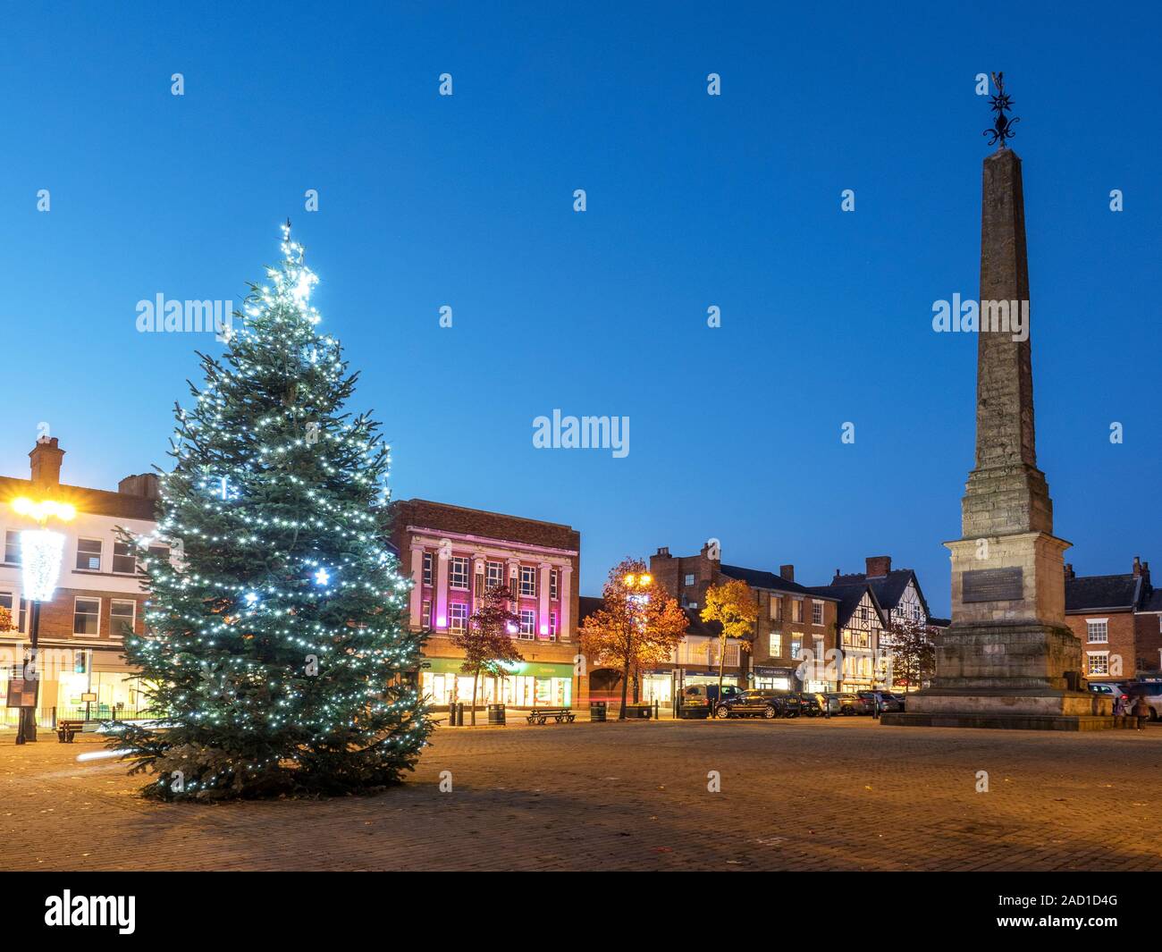 Christmas tree and Ripon Obelisk in the Market Place at dusk Ripon