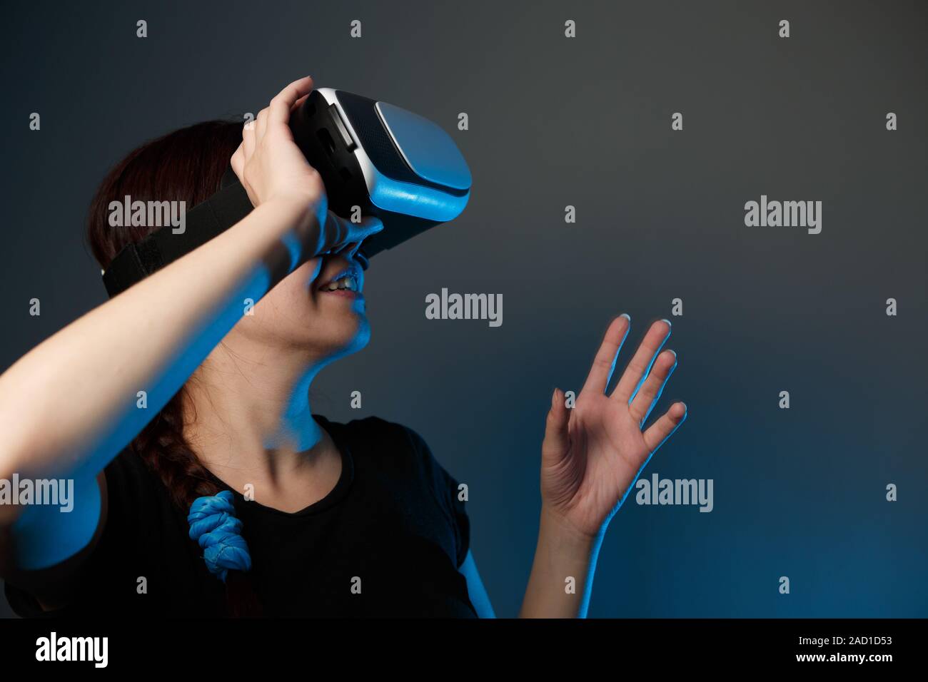 Woman using the virtual reality headset Stock Photo