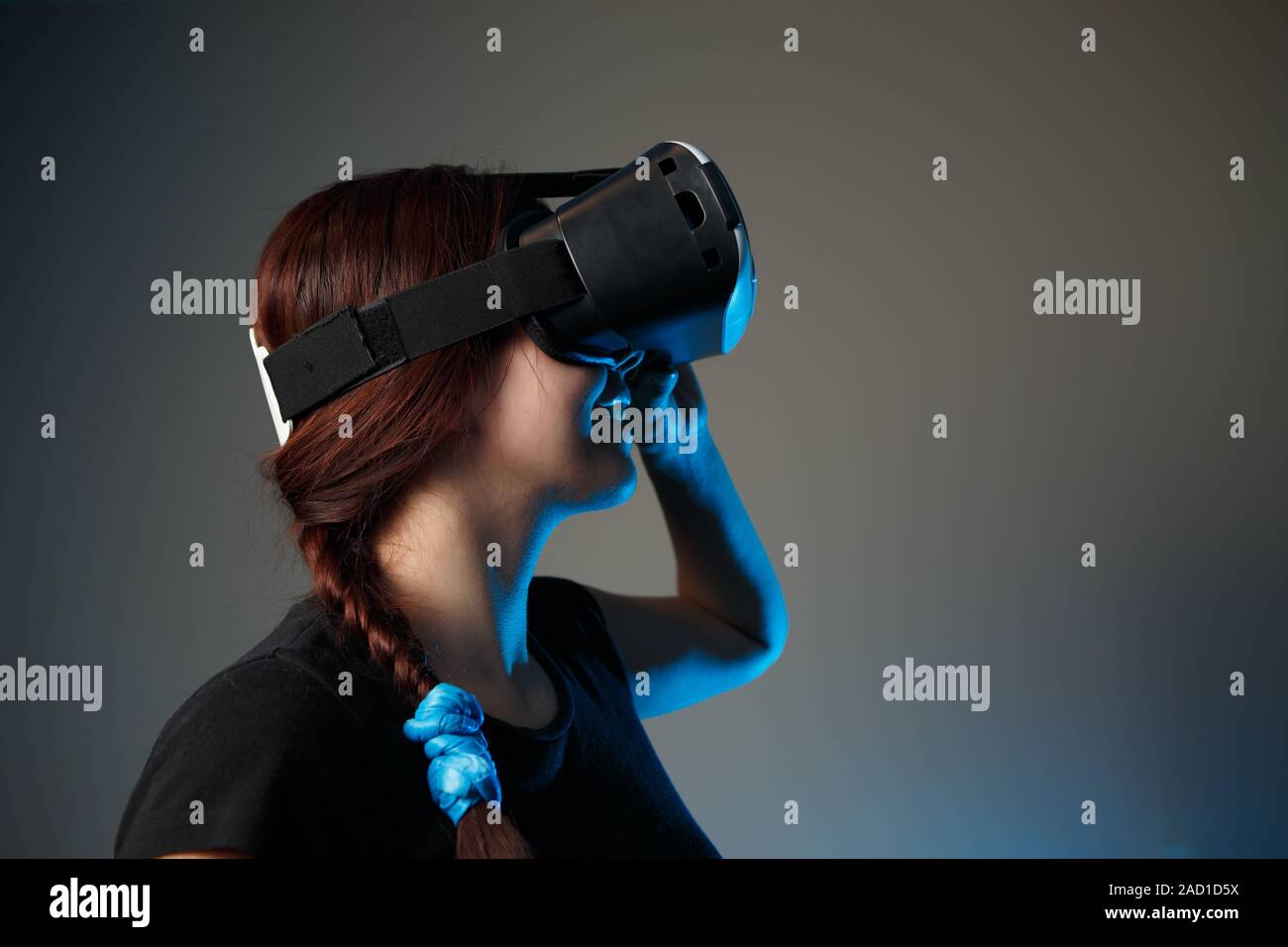 Woman using the virtual reality headset Stock Photo
