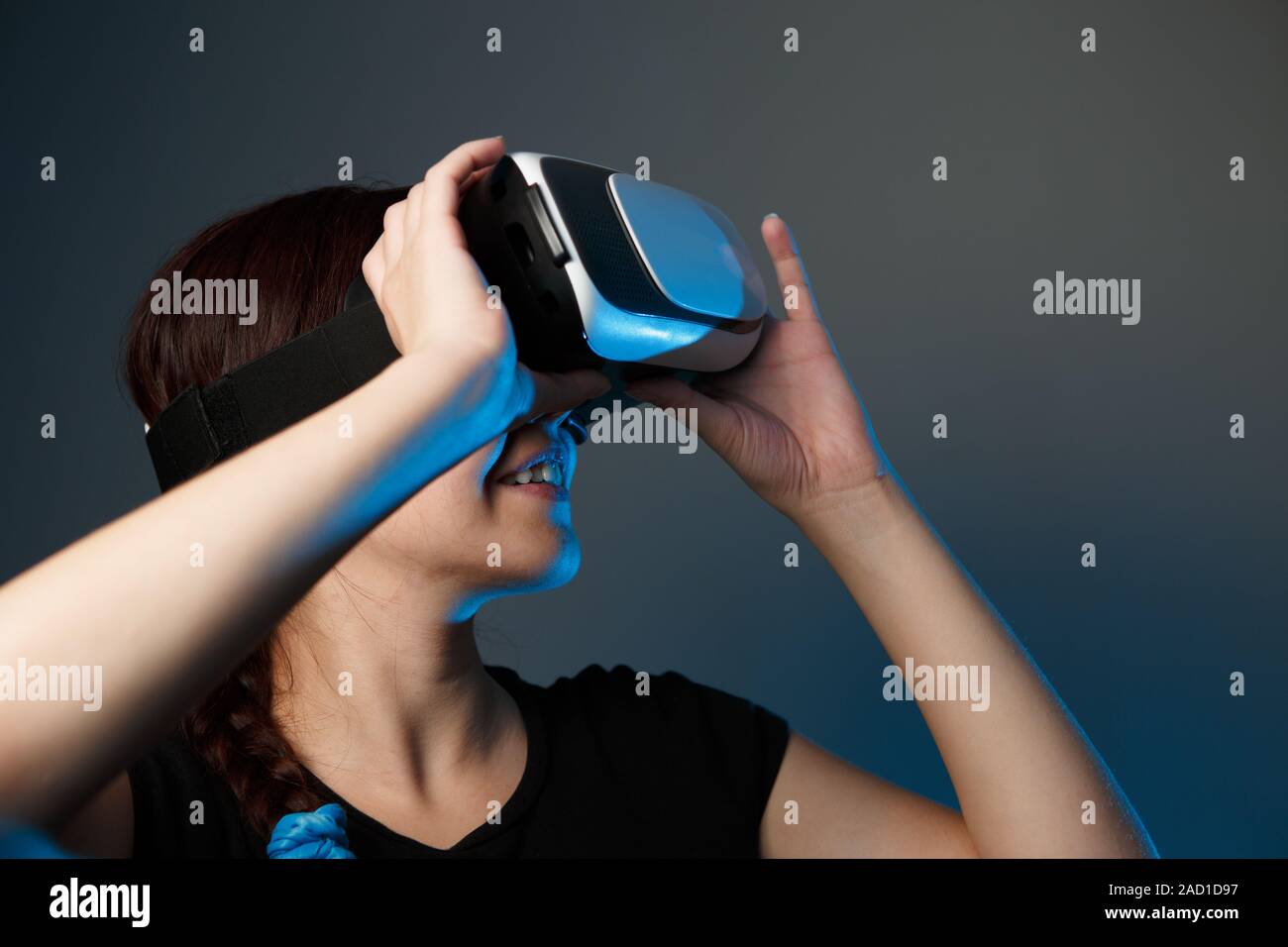 Woman using the virtual reality headset Stock Photo