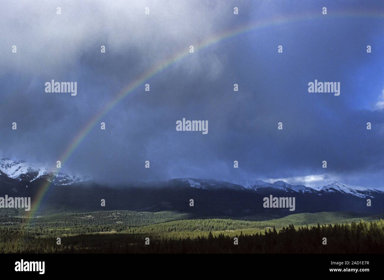 Rainbow in front of the Maligne Range / Jasper National Park Stock Photo
