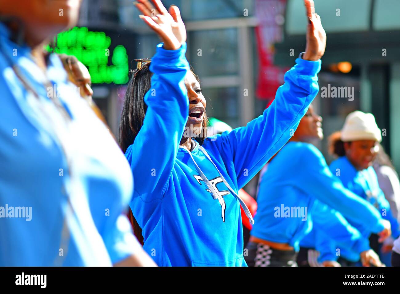 Marchers singing during the Thanksgiving Day parade in Charlotte, NC