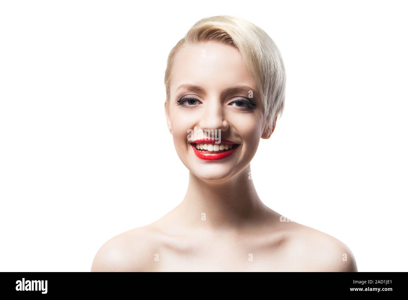 Cheerful blonde-haired model with red lips smiling at camera Stock Photo