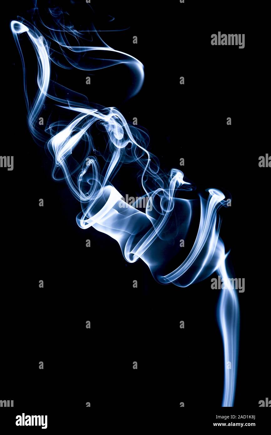 Blue smoke on black background Stock Photo