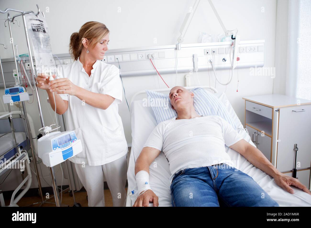 Chemotherapy treatment. Cancer patient undergoing chemotherapy in a ...
