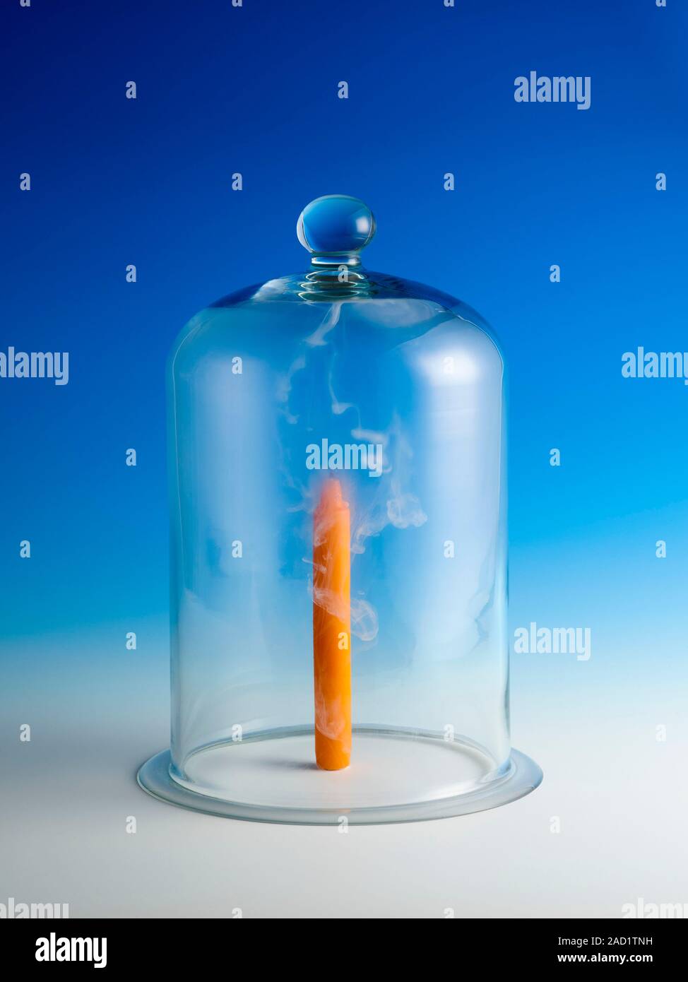 Candle in a bell jar. The candle has extinguished, showing that the
