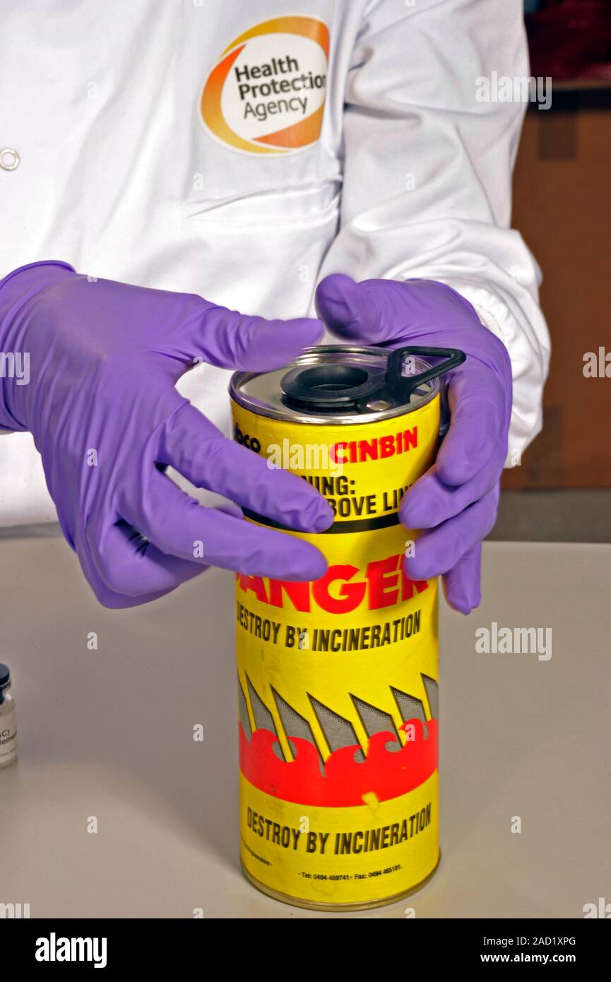 Safe disposal of laboratory waste. Closeup of a scientist using a