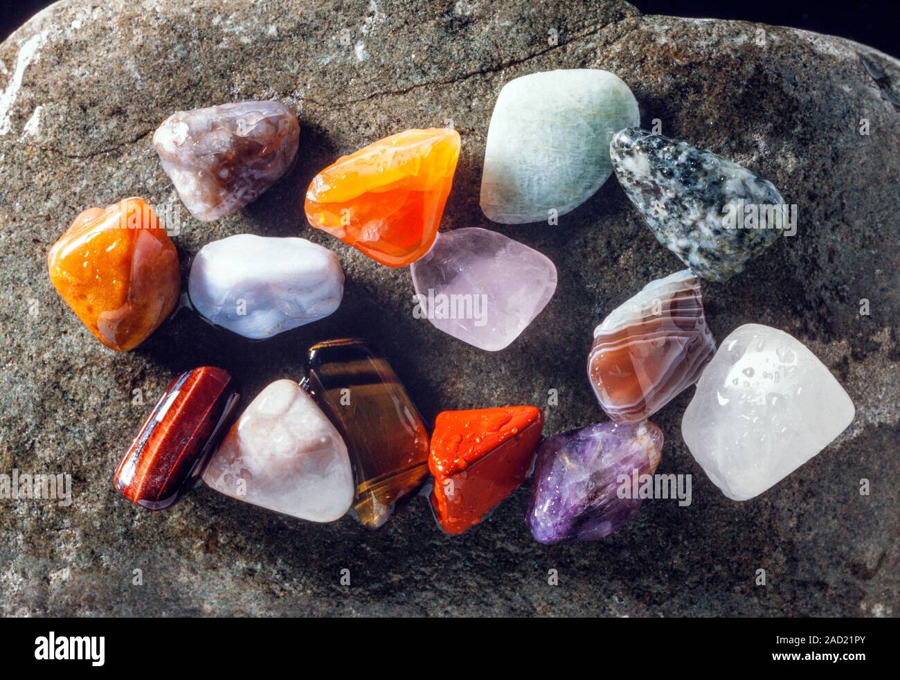 Tumbled wet gemstones Stock Photo Alamy