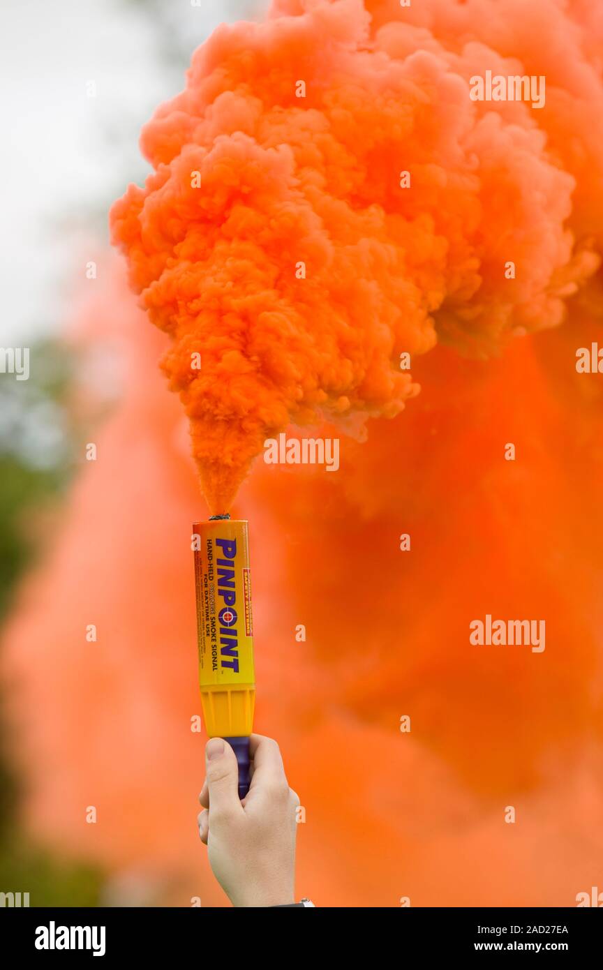Emergency flare to attract incoming Sea King Helicopter. Stock Photo