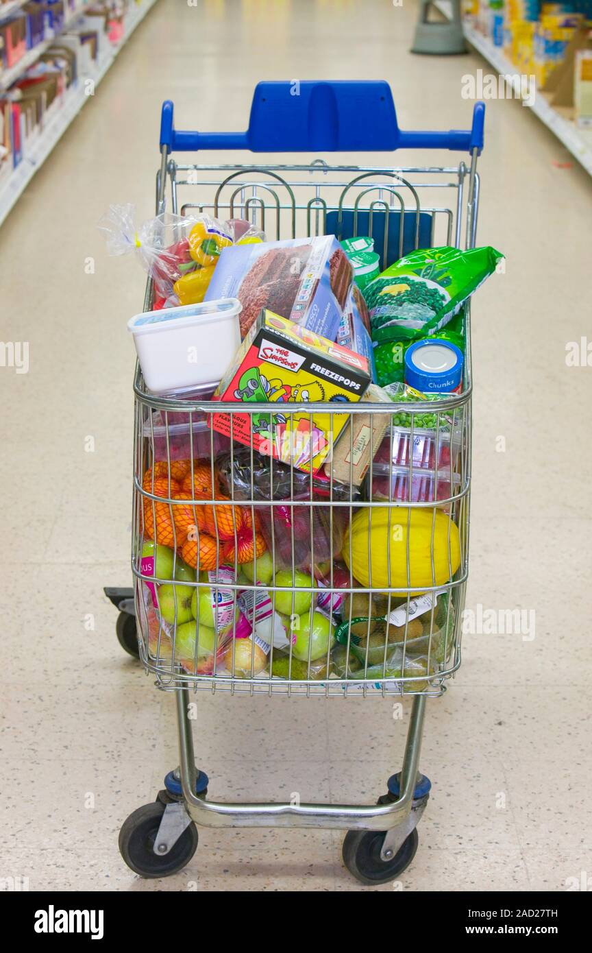 a-full-trolley-of-food-shopping-in-a-supermarket-stock-photo-alamy
