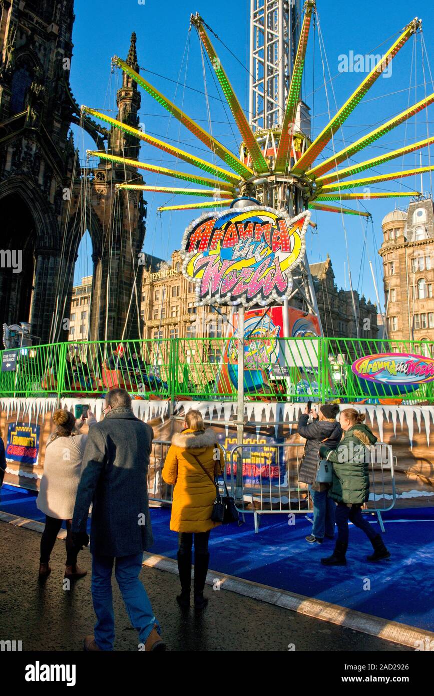 Walter Scott Monument and high Star Flyer fairground ride. Edinburgh