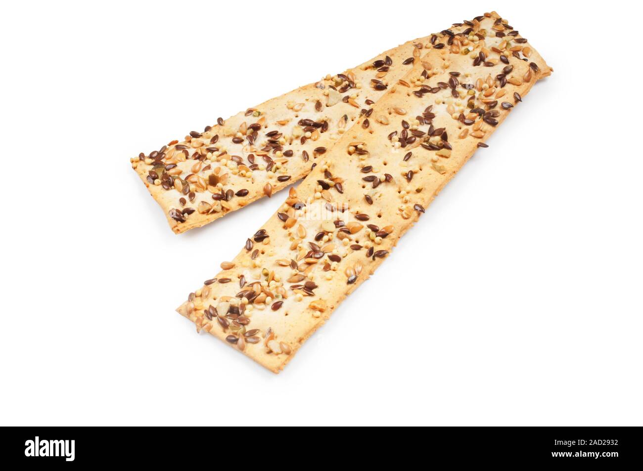 Studio shot of multi seed flatbread cut out against a white background - John Gollop Stock Photo