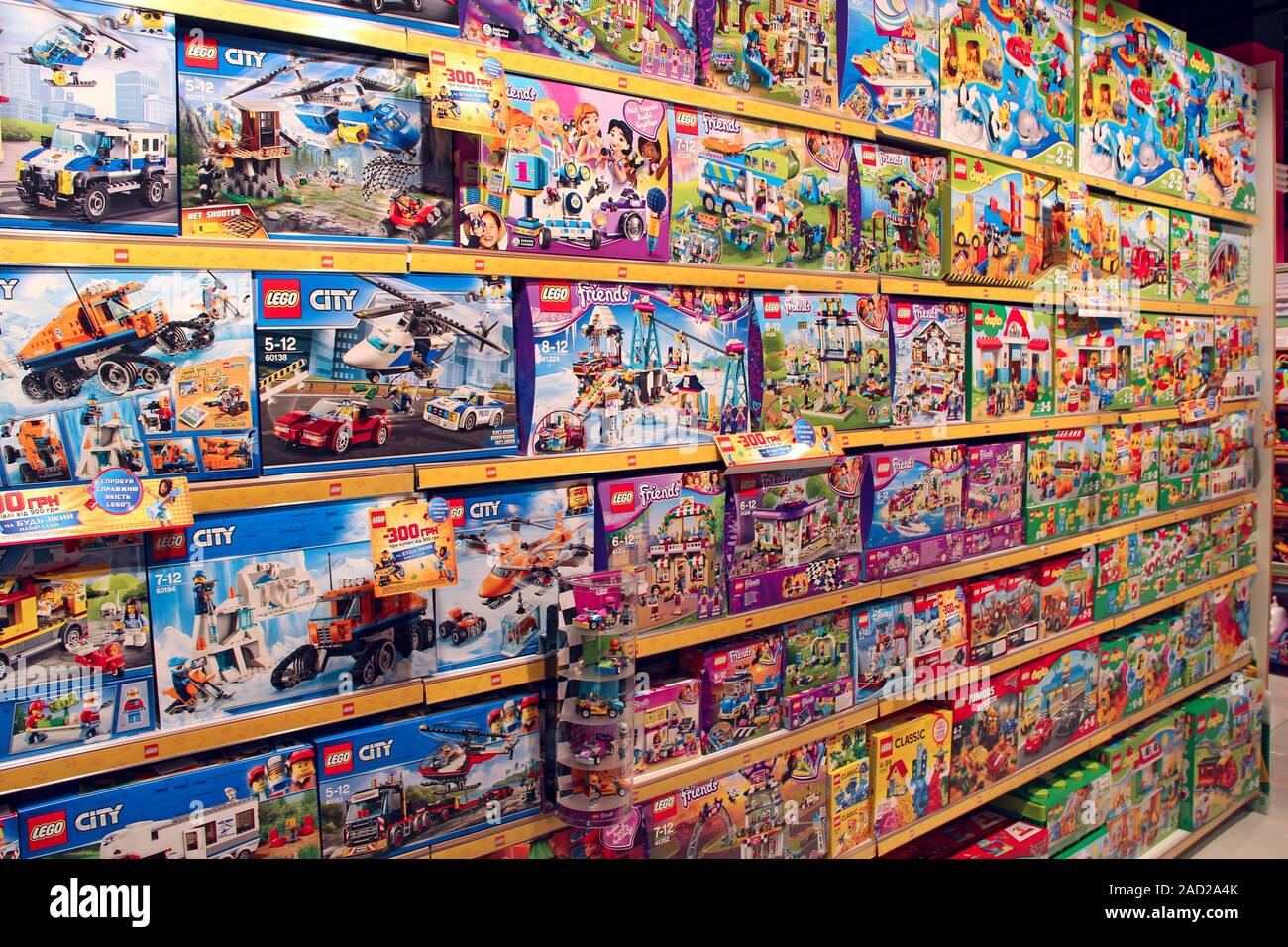 Shop toys. Toy store. Inside toy shop. Rows of shelves with toys.  Children's joy. Wide selection of toys in children's store. Shop for  children Stock Photo - Alamy