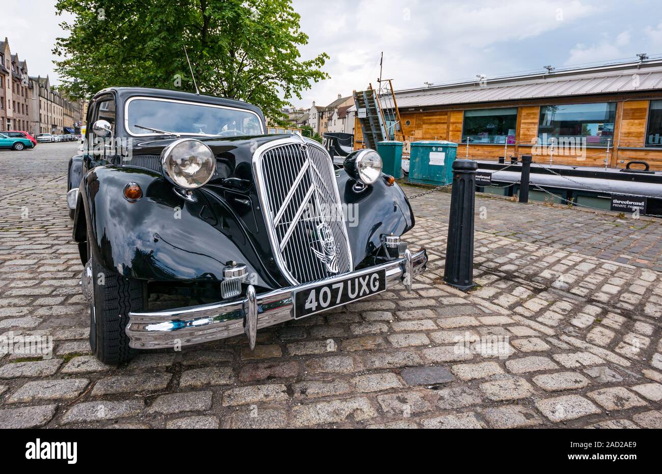 1954 vintage Citroën Traction Avant, or Big Six, parked on The Shore cobbled road, Water of Leith, Edinburgh, Scotland, UK Stock Photo