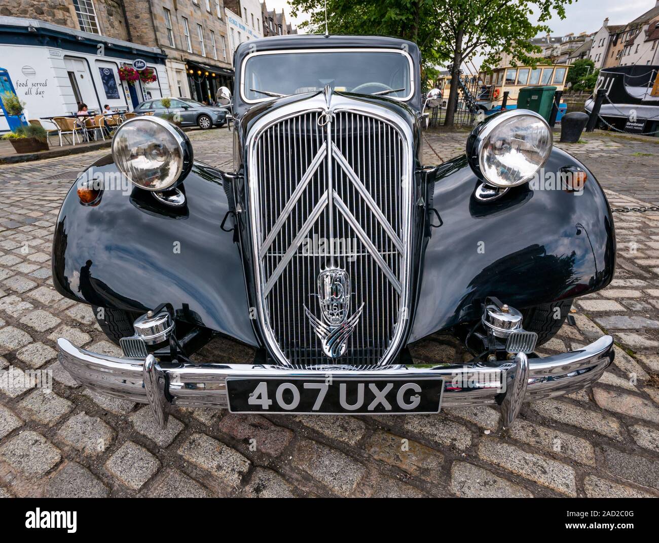 1954 vintage Citroën Traction Avant, or Big Six, parked on The Shore cobbled road, Water of Leith, Edinburgh, Scotland, UK Stock Photo