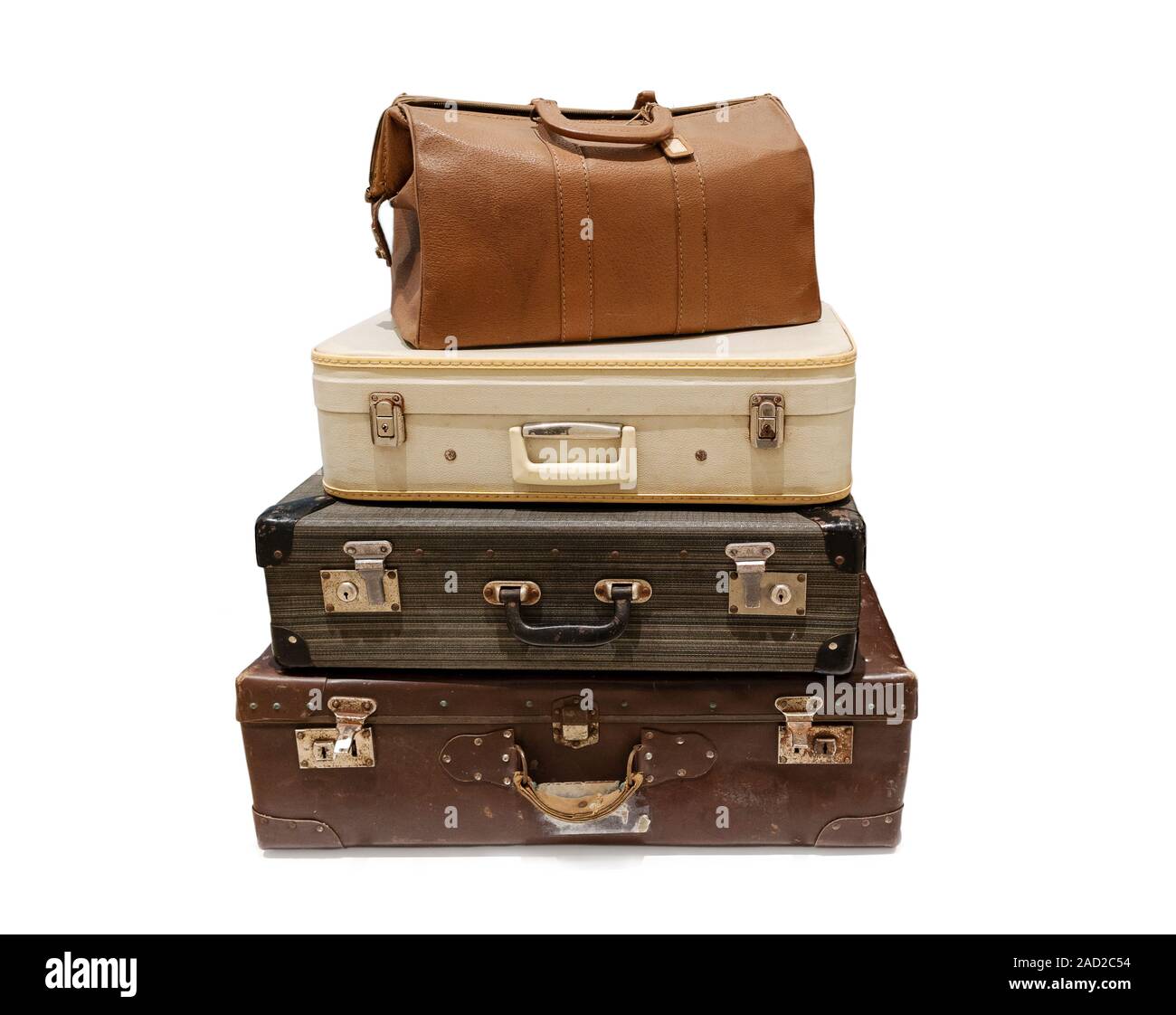 Pile of vintage Suitcases isolated on white background. Old Travel Luggage. Travel concept Stock Photo