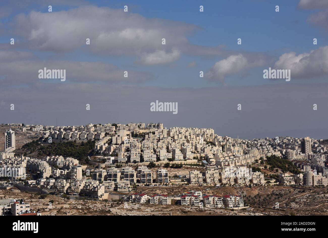 Bethlehem, West Bank. 03rd Dec, 2019. The Israeli settlement of Har Homa is seen on the hilltop overlooking the Palestinian town of Bethlehem, West Bank, December 3, 2019. Palestinian officials say the biblical city of Bethlehem is being suffocated by the expansion of Israeli settlements that is taking Palestinian lands to build Jewish homes in the West Bank. Photo by Debbie Hill/UPI Credit: UPI/Alamy Live News Stock Photo