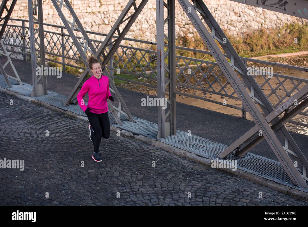 sporty woman jogging on morning Stock Photo Alamy